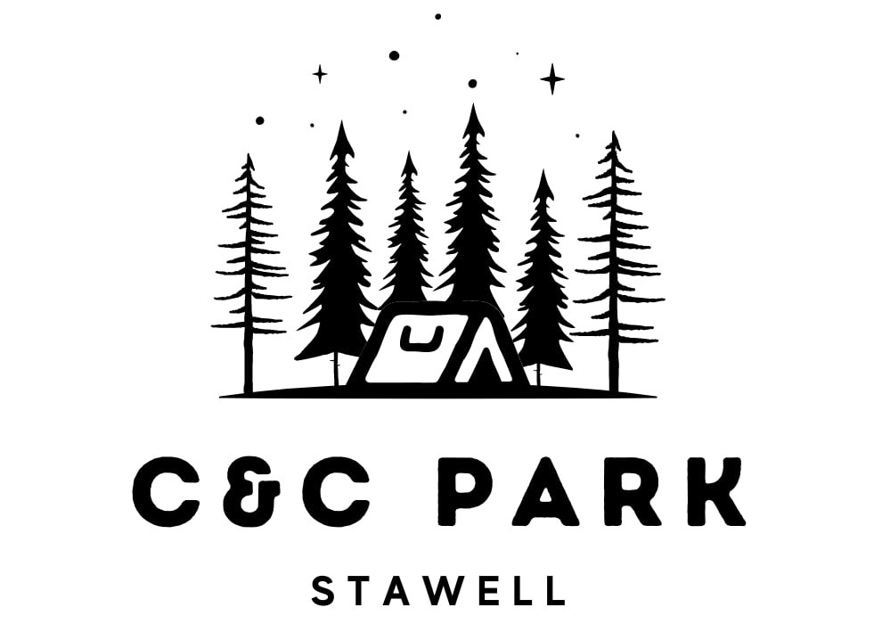 A minimalist black-and-white logo for 'C&C PARK' located in Stawell. The design features stylized pine trees surrounding a simple tent, with small stars above creating a serene camping atmosphere. The name 'C&C PARK' is prominently displayed in bold, uppercase letters, with 'STAWELL' positioned beneath it in smaller lettering